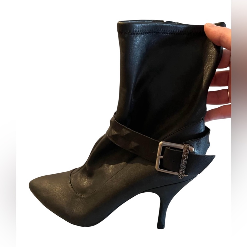 BCBG eneration high heel black bootie, size 9/39. Chrome belt buckle